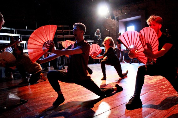 Rose Bruford College students performing with hand fans